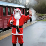 Santa waving from platform